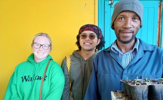 cape town student volunteers with local