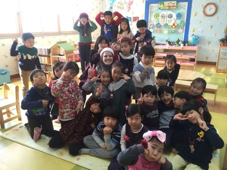 Teacher in Santa hat with class full of students in South Korea